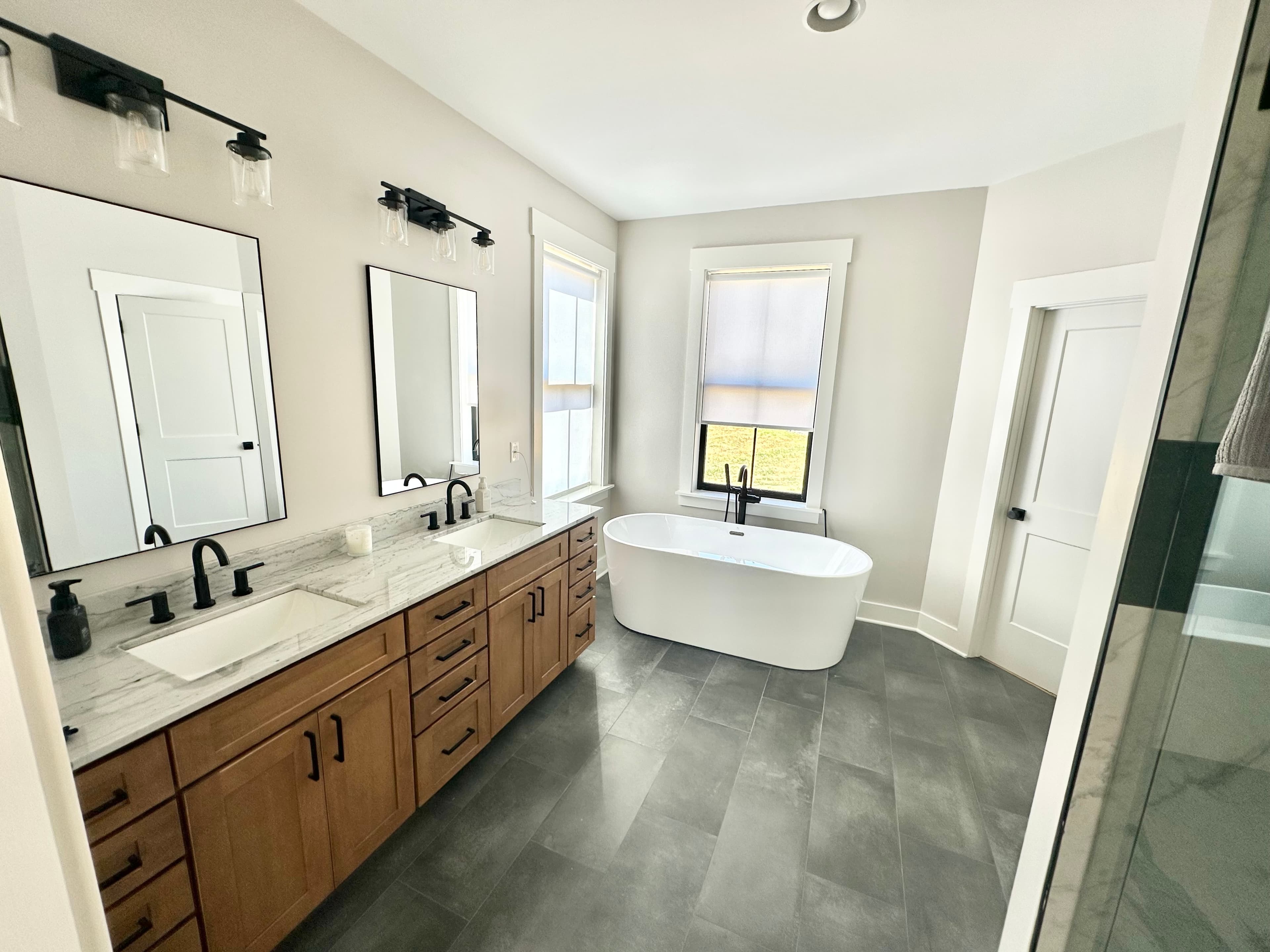 Luxury bathroom by Resolute Homes